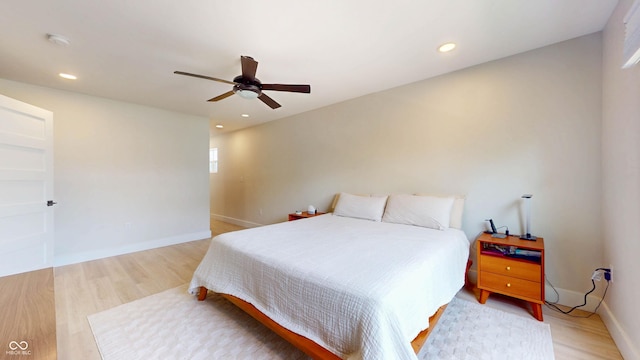 615 Orange St, Indianapolis, IN 46203 - bedroom featuring light wood-type flooring, recessed lighting, ceiling fan, and baseboards