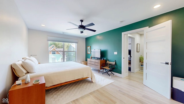 615 Orange St, Indianapolis, IN 46203 - bedroom featuring light wood-style floors, recessed lighting, ceiling fan, and baseboards