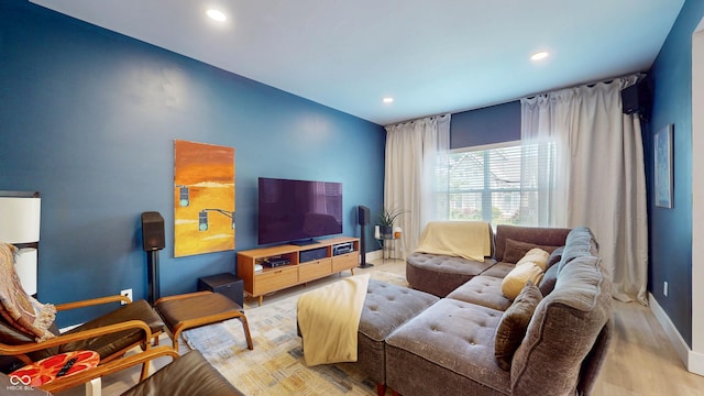615 Orange St, Indianapolis, IN 46203 - living room featuring recessed lighting, baseboards, and light wood finished floors