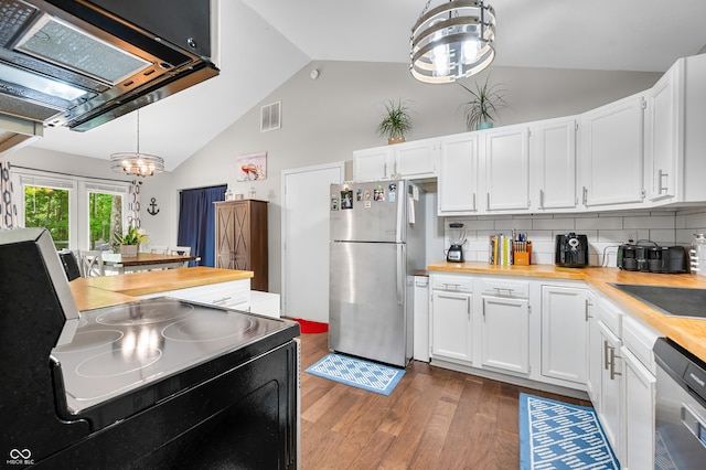 6933 Grey Wolf Dr, Hamblen Township, IN 46164 - kitchen featuring stainless steel appliances, a chandelier, wood finished floors, white cabinets, and high vaulted ceiling