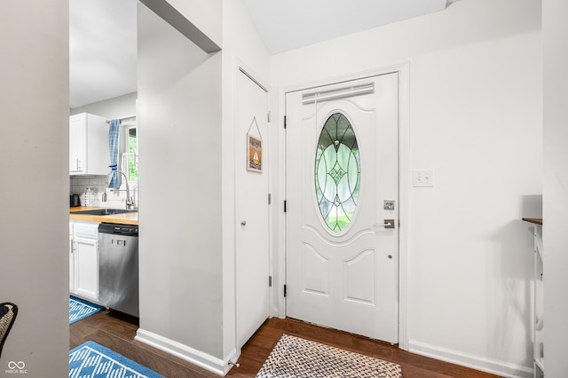6933 Grey Wolf Dr, Hamblen Township, IN 46164 - entryway with dark wood-style flooring and baseboards
