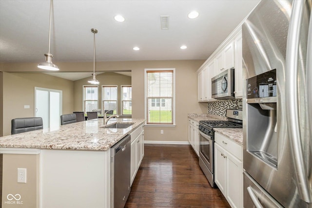 5767 Bluff View Ln, Whitestown, IN 46075 - kitchen featuring stainless steel appliances, a sink, a kitchen island with sink, dark wood-type flooring, and baseboards