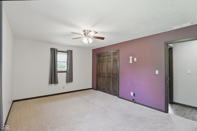 8510 N Carroll Rd, Indianapolis, IN 46236 - carpeted empty room with a ceiling fan, baseboards, and a textured ceiling