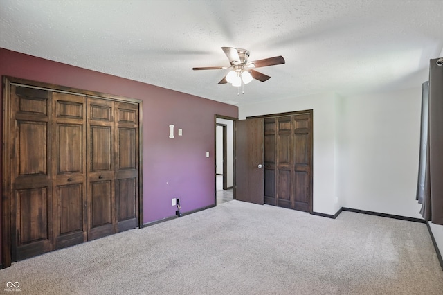 8510 N Carroll Rd, Indianapolis, IN 46236 - unfurnished bedroom featuring carpet, baseboards, ceiling fan, and a textured ceiling