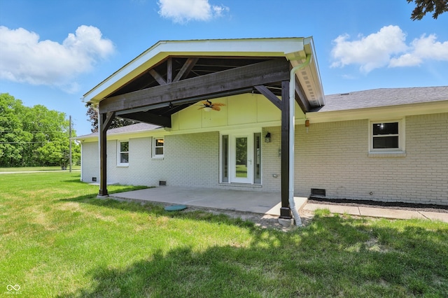 8510 N Carroll Rd, Indianapolis, IN 46236 - back of house featuring a ceiling fan, crawl space, a lawn, and brick siding