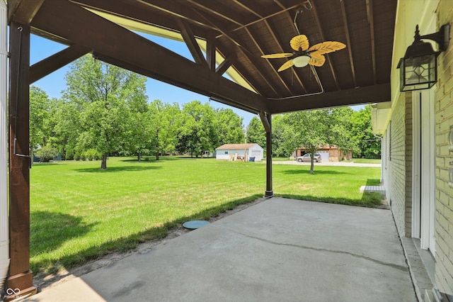 8510 N Carroll Rd, Indianapolis, IN 46236 - view of patio / terrace featuring a ceiling fan and view of wooded area