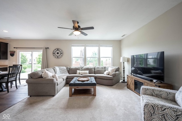 14514 Glapthorn Rd, Fishers, IN 46037 - living area with ceiling fan, recessed lighting, and light colored carpet
