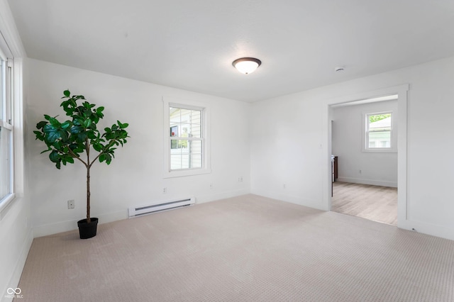 2602 State St, New Castle, IN 47362 - unfurnished room with a baseboard heating unit, carpet flooring, and baseboards