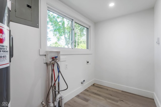 2602 State St, New Castle, IN 47362 - laundry area with hookup for a washing machine, hookup for an electric dryer, electric panel, light wood finished floors, and baseboards