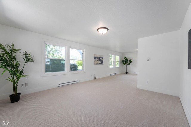 2602 State St, New Castle, IN 47362 - carpeted spare room featuring a baseboard radiator and baseboards