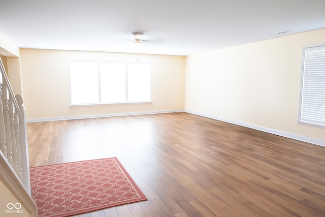 2388 Cedarmill Dr, Franklin, IN 46131 - empty room with wood finished floors and ceiling fan
