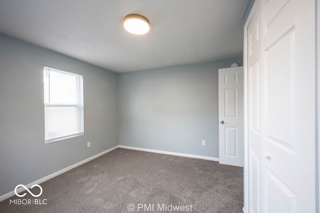 5050 W Regent St, Indianapolis, IN 46241 - empty room featuring carpet and baseboards