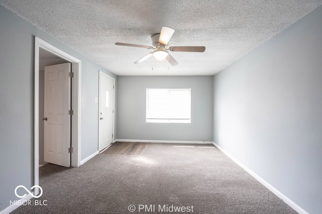 5050 W Regent St, Indianapolis, IN 46241 - carpeted spare room featuring ceiling fan, a textured ceiling, and baseboards