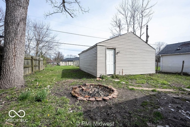 5050 W Regent St, Indianapolis, IN 46241 - view of outdoor structure with a fire pit