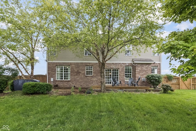 8663 N Commonview Dr, Mccordsville, IN 46055 - rear view of house featuring a wooden deck and brick siding