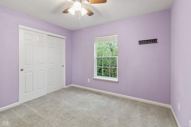 8663 N Commonview Dr, Mccordsville, IN 46055 - unfurnished bedroom featuring carpet floors, baseboards, a closet, and ceiling fan