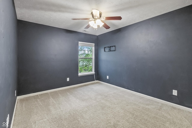 8663 N Commonview Dr, Mccordsville, IN 46055 - unfurnished room with a ceiling fan, carpet flooring, baseboards, and a textured ceiling