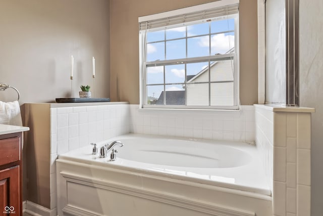 8663 N Commonview Dr, Mccordsville, IN 46055 - bathroom featuring plenty of natural light, vanity, and a bath