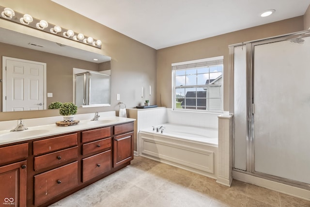 8663 N Commonview Dr, Mccordsville, IN 46055 - bathroom featuring double vanity, a stall shower, a garden tub, and tile patterned flooring