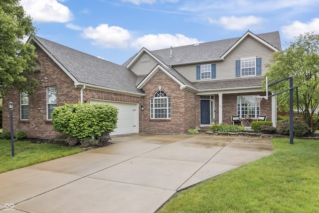 8663 N Commonview Dr, Mccordsville, IN 46055 - traditional home featuring brick siding, covered porch, roof with shingles, and a front yard