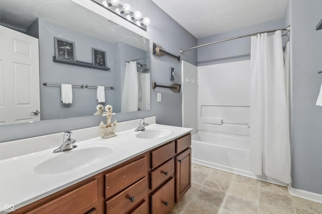 8663 N Commonview Dr, Mccordsville, IN 46055 - full bathroom with shower / bath combination with curtain, double vanity, and stone finish floors