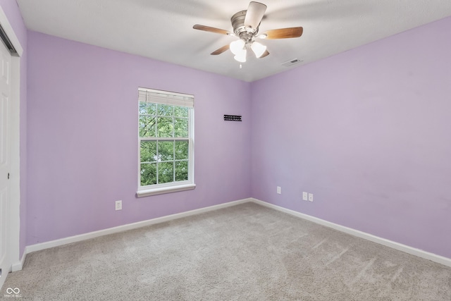 8663 N Commonview Dr, Mccordsville, IN 46055 - spare room featuring carpet, ceiling fan, and baseboards