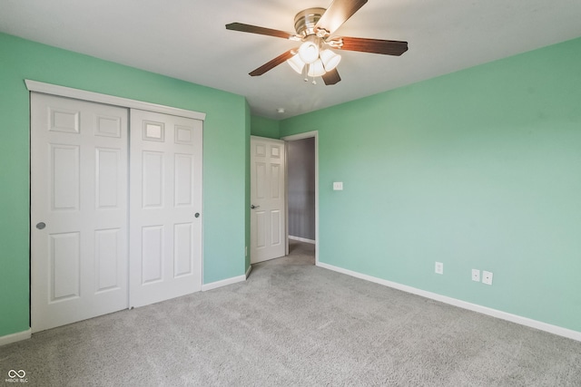 8663 N Commonview Dr, Mccordsville, IN 46055 - unfurnished bedroom with carpet flooring, baseboards, a closet, and ceiling fan