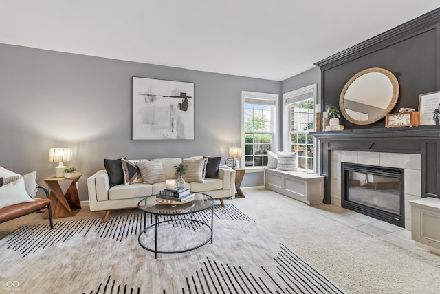 8663 N Commonview Dr, Mccordsville, IN 46055 - living area featuring light carpet, a fireplace, and baseboards
