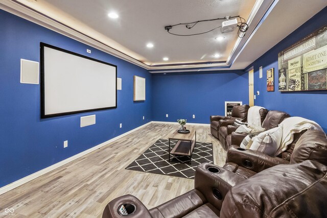 8663 N Commonview Dr, Mccordsville, IN 46055 - cinema featuring wood finished floors, a raised ceiling, baseboards, and recessed lighting