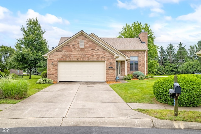 1105 Sarah Ct, Greenwood, IN 46142 - view of front of home with a front yard, a chimney, and brick siding