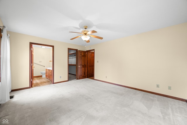 1105 Sarah Ct, Greenwood, IN 46142 - unfurnished bedroom featuring light colored carpet, baseboards, and ensuite bathroom