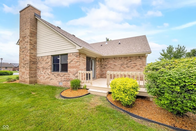 1105 Sarah Ct, Greenwood, IN 46142 - back of house with a chimney, brick siding, a yard, and a deck