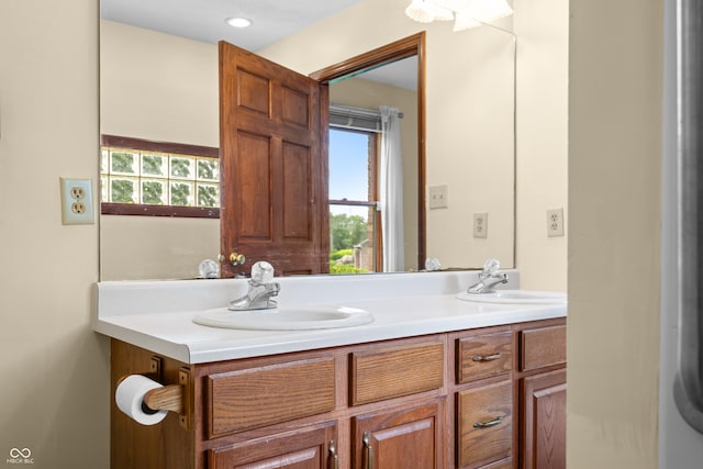 1105 Sarah Ct, Greenwood, IN 46142 - full bathroom with double vanity and healthy amount of natural light