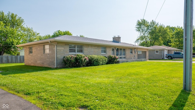1460 W Mckay Rd, Shelbyville, IN 46176 - view of front of house with a chimney and stone siding