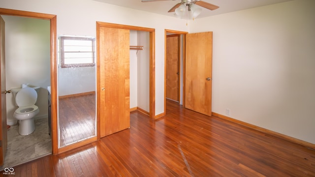 1460 W Mckay Rd, Shelbyville, IN 46176 - unfurnished bedroom with hardwood / wood-style flooring, baseboards, and a closet