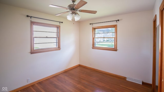 1460 W Mckay Rd, Shelbyville, IN 46176 - unfurnished bedroom featuring wood finished floors and baseboards