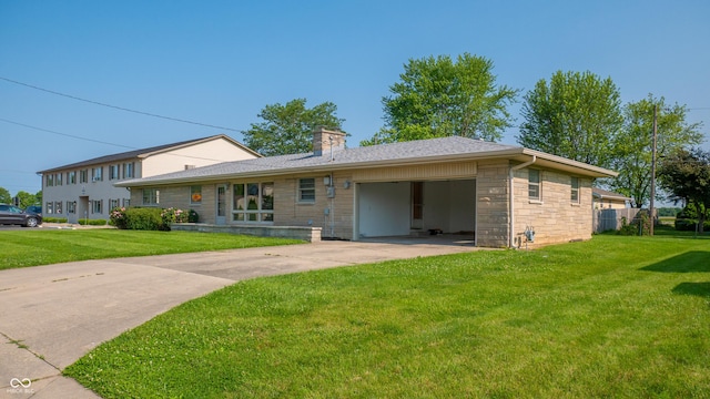 1460 W Mckay Rd, Shelbyville, IN 46176 - view of front of property with stone siding, a garage, a front yard, and driveway