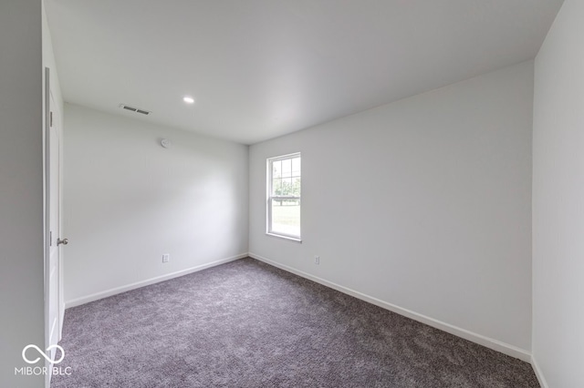 32 Downing Dr, Trafalgar, IN 46181 - unfurnished room featuring carpet, baseboards, and recessed lighting