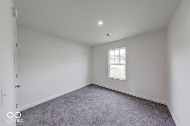 32 Downing Dr, Trafalgar, IN 46181 - carpeted spare room featuring baseboards