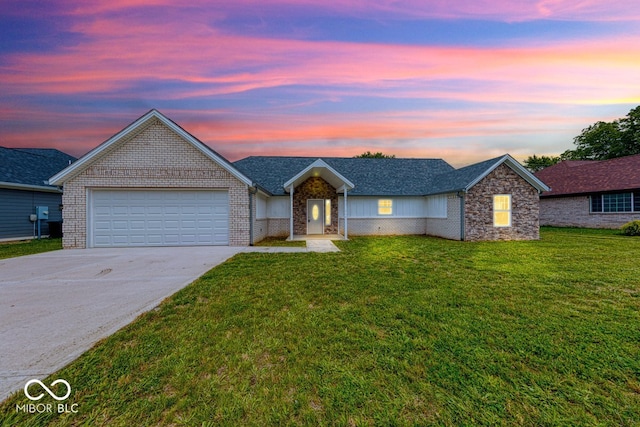 32 Downing Dr, Trafalgar, IN 46181 - ranch-style house featuring concrete driveway, a garage, brick siding, and a front lawn