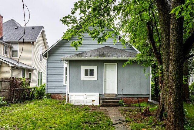 3652 N Kenwood Ave, Indianapolis, IN 46208 - back of house with entry steps and a shingled roof