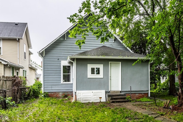 3652 N Kenwood Ave, Indianapolis, IN 46208 - rear view of house featuring entry steps and roof with shingles