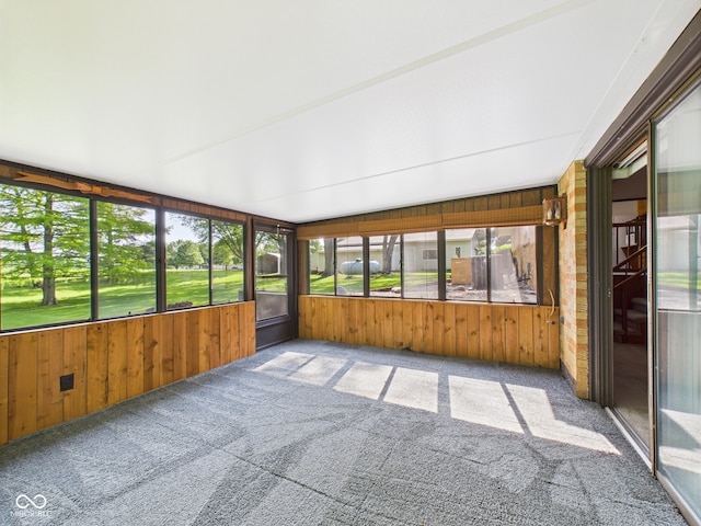4733 E 100 S, Anderson, IN 46017 - unfurnished sunroom featuring carpet, plenty of natural light, and wooden walls
