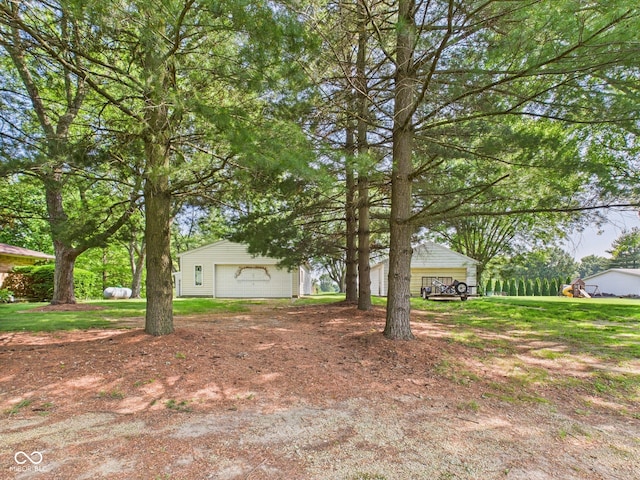 4733 E 100 S, Anderson, IN 46017 - view of front of house with a detached garage