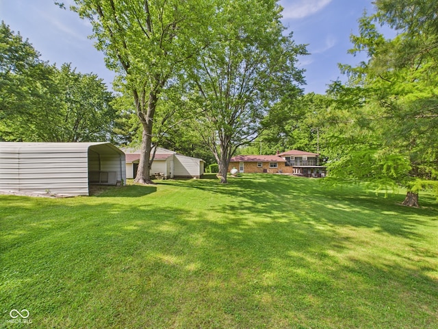 4733 E 100 S, Anderson, IN 46017 - view of grassy yard with a carport