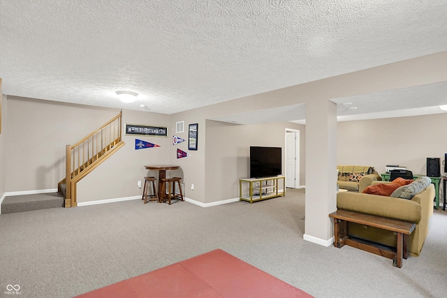 8030 Parcrest Ct, Indianapolis, IN 46259 - living room featuring carpet, a textured ceiling, and stairs