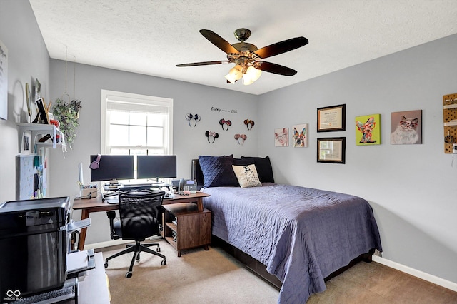 8030 Parcrest Ct, Indianapolis, IN 46259 - carpeted bedroom with an office area, ceiling fan, and a textured ceiling