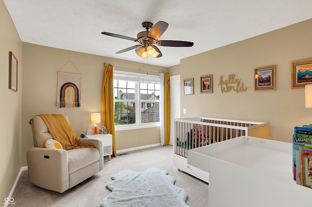 8030 Parcrest Ct, Indianapolis, IN 46259 - carpeted bedroom featuring a ceiling fan and a nursery area
