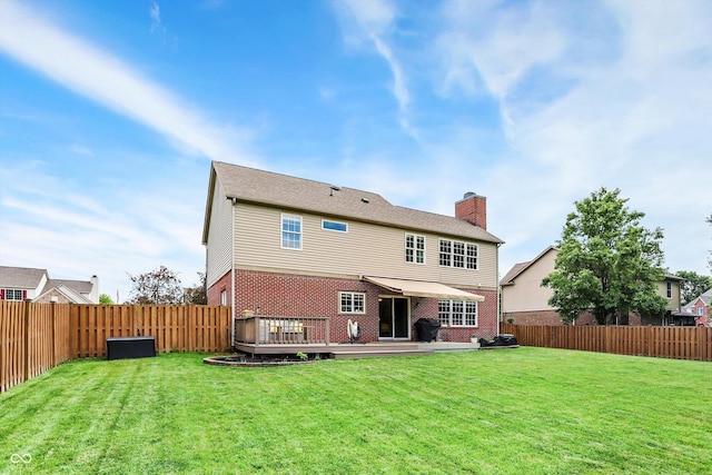 8030 Parcrest Ct, Indianapolis, IN 46259 - back of property featuring brick siding, a fenced backyard, a chimney, and a deck