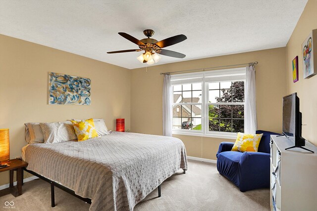 8030 Parcrest Ct, Indianapolis, IN 46259 - bedroom featuring light carpet and ceiling fan
